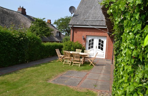 Midlum House | Vacation home Dat Strandgood for up to 6 people in Oveneum.