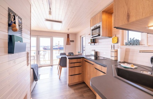 Fehmarnsund House | Vacations on a houseboat - pure relaxation for water and landlubbers alike!
