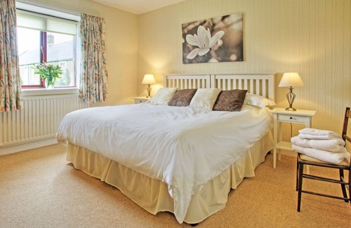 Belford Cottage | Very spacious living area & large secure garden, dog friendly