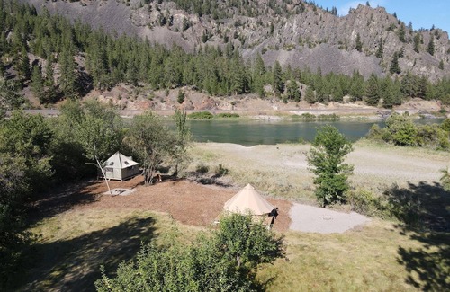Glacier Country Cabin | Victorian Dream, glamping by the river, 2 miles from Quinn's Hot Springs Resort.