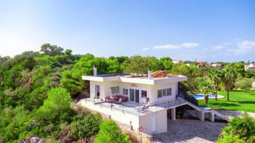 Pitharion Villa | Villa Afroditi in Chania near Airport with Private Pool, Free Wi-Fi, Souda Bay Views, Garden Oasis