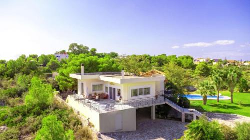 Pitharion Villa | Villa Afroditi in Chania near Airport with Private Pool, Free Wi-Fi, Souda Bay Views, Garden Oasis