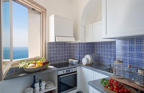 Praiano Villa | Villa Flaviana: An elegant and welcoming three-story villa built sheer above the sea, with Free WI-FI.