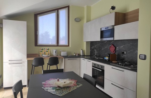 Locate Varesino Apartment | Villa I Sette Pini Splendid modernly furnished penthouse.