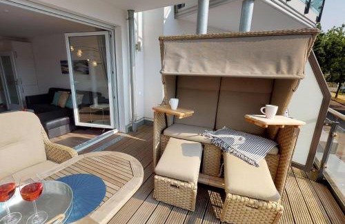 Pelzerhaken Apartment | Villa Meeresrauschen Carpe Diem mit großzügiger Terrasse und extragroßem Strandkorb
