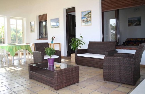 Marina di Modica Villa | Villa Sara, an air-conditioned veranda overlooking the sea.