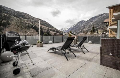 Colle Isarco Apartment | Villa Tribulaunblick - Exklusives Designapartment mit Kamin, Traumterrasse und Panoramablick