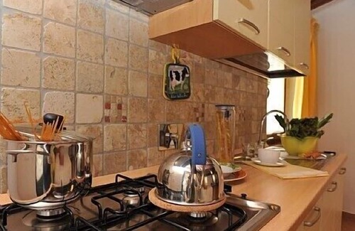 Citerna House | Villa Vezzosa A: A graceful apartment that is part of an ancient country house with strong character, which derives from it actually being restored from an old kiln, with Free WI-FI.