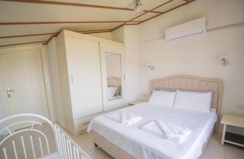 Faralya Villa | Villa with Shared Pool and Sea View in Seydikemer