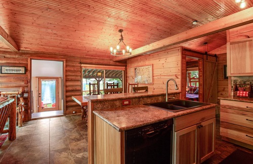 Belfair Cabin | Vintage Mid-Century Modern Lakefront Log Cabin