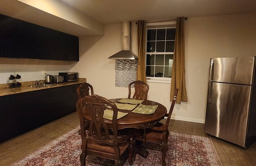 Triangle House | Walk in sunny furnished basement with 2 bedrooms and 2 bathrooms