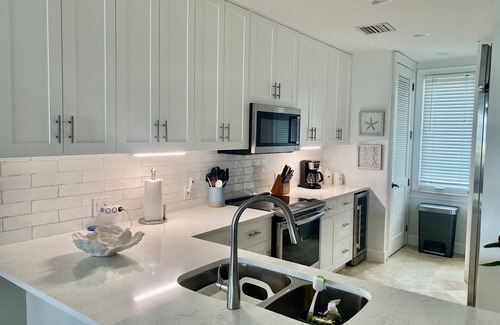 Grace Bay Condo | Walk Out of this Elegant 2 Bedroom Condominium On To Stunning Grace Bay Beach!