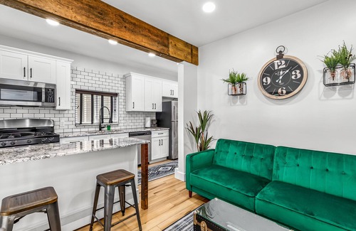 Holly Apartment | Walk to downtown Holly from this newly renovated historic apartment!