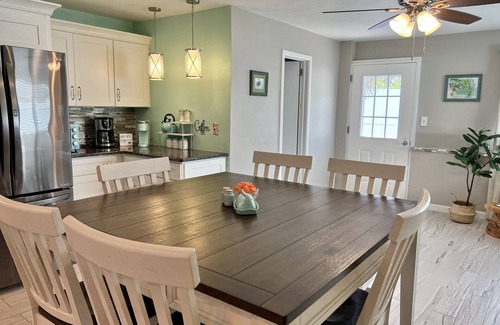 Sunny Shores House | Walk to the beach! Spacious home with comfy beds, game room, & fenced yard.