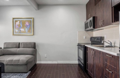 Northwest Calgary Apartment | Walkout Suite in Nolan Hill 2BR Shopping & AC