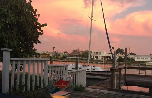 Capri Isle House | Watch sunsets from waterfront deck of 3,000 sq-ft. home in Tampa Bay beach town!
