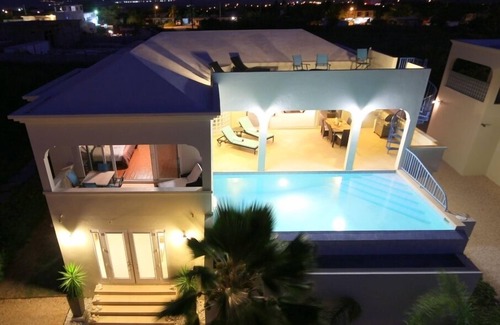 South Hill Villa | Water views, central location and infinity pool