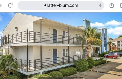 Slidell Condo | Waterfront, Amazing sunset overlooking pool.