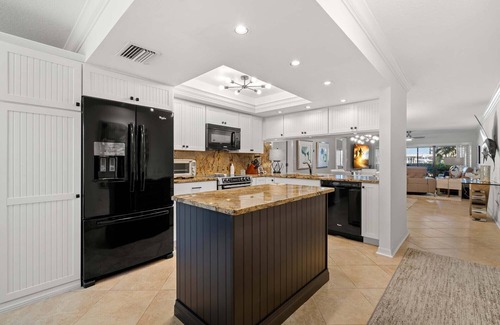 Bayway Isles Condo | Waterfront Condo With Resort Pool, Near the Ocean