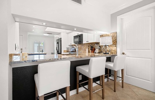Bayway Isles Condo | Waterfront Condo With Resort Pool, Near the Ocean