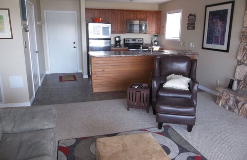 Lake Ozark Condo | Waterfront Condo with Walk-Out to Pool & Lake! Beautiful Inside! Electric Grill!
