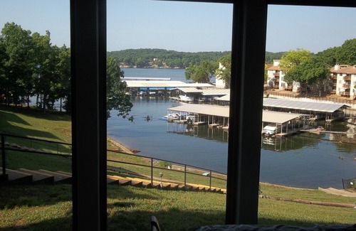 Lake Ozark Condo | Waterfront Condo with Walk-Out to Pool & Lake! Beautiful Inside! Electric Grill!