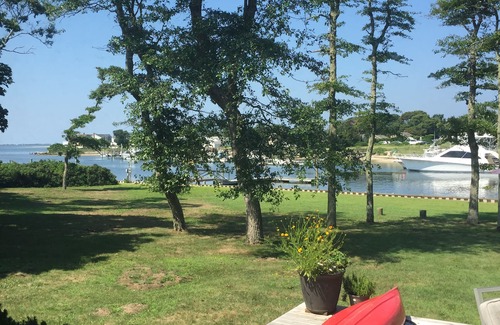 Hampton Bays House | Waterfront home with deep water dock on Penny Pond