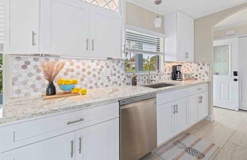 Convair Cove House | Waterfront Home with Heated Pool & Spa | Dock | 4.5 Blocks to Beach & Downtown