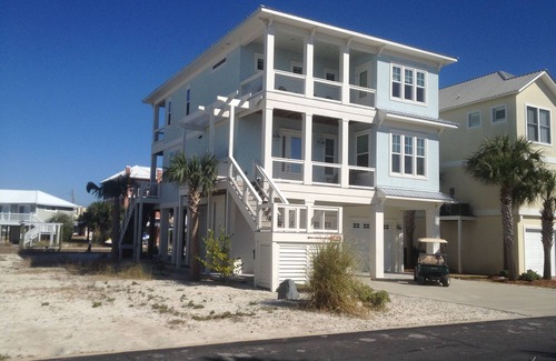 Navarre Beach House | Waterfront Home with Golf Cart, Kayaks, Bikes and Paddleboards!