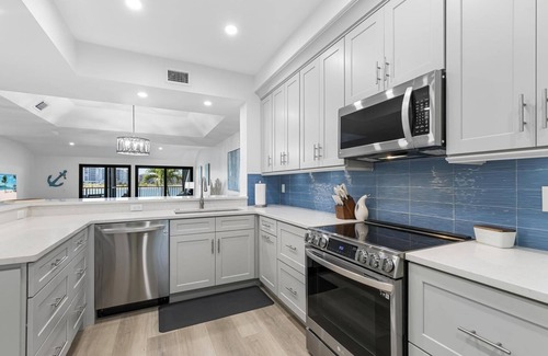 Marco Island Condo | Waterfront relaxation in a beautifully updated large condo!