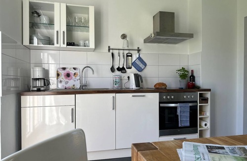 Nordseebad Burhave Apartment | Wattkante Burhave, Apartment Ebbe & Flut: Danish stove, 70 sqm, near the beach
