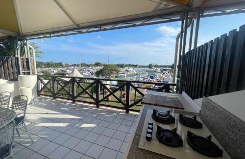 Lignano Riviera Apartment | Welc-ōM Lignano swim and fun with dock view
