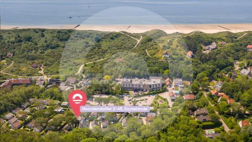 Zoutelande House | Welcome in - Vakantiewoning Noordendolfer 2-49, Tuin met zonnig terras, fietsenstalling, parkeerplaats, dichtbij zee en strand