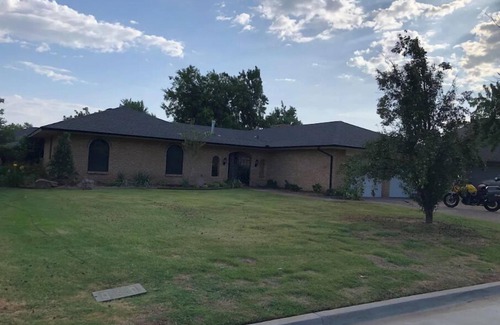 Oklahoma City House | Welcome to Camelot! This home is in a quiet neighborhood close to OKC activity.