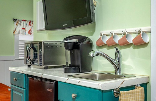 East Hill House | Welcome to the charming Gnome Home, your cozy retreat in the heart of Vernon!