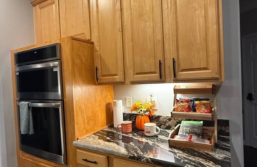 Greensboro House | Welcome to The Clover, a spacious 2-story vacation home that blends charm with modern comfort. Perfect for families, friends, or groups, this cozy retreat features inviting living spaces, a fully equipped modern kitchen & comfortable bedrooms.