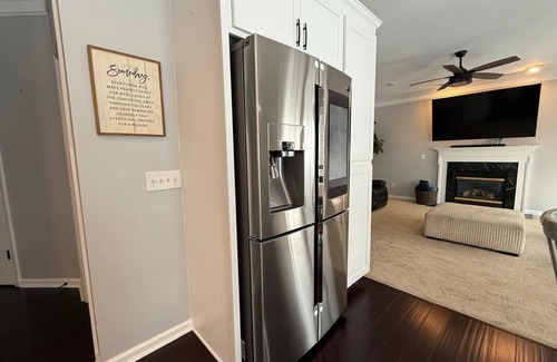 Greensboro House | Welcome to The Clover, a spacious 2-story vacation home that blends charm with modern comfort. Perfect for families, friends, or groups, this cozy retreat features inviting living spaces, a fully equipped modern kitchen & comfortable bedrooms.