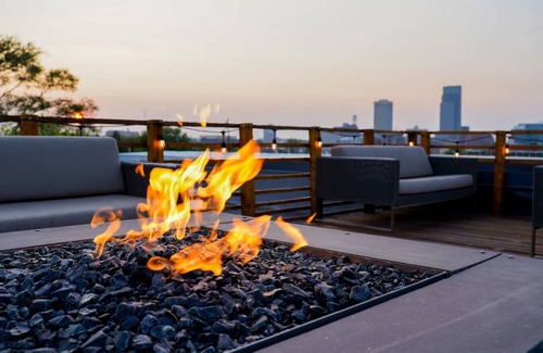 Little Italy House | Welcome to the Jungle Rooftop, 85" TV, Wine firep
