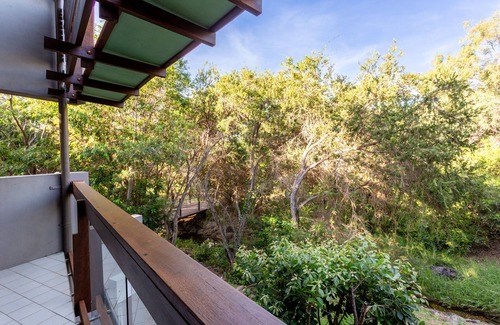 Zilzie Apartment | Welcome to the Serene Scene at Lakewood, where tranquility meets natural beauty.
