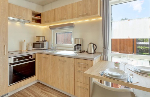 Wemding House | Welcome to this modern vacation home with panoramic views of the lake!