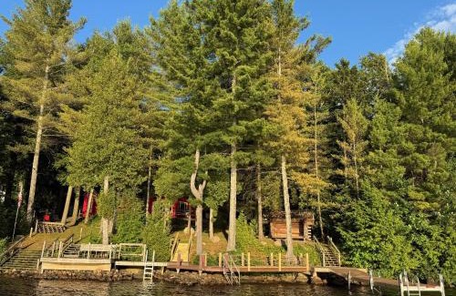 Lyon Mountain House | Well-appointed Adirondack cabin directly on 9-mile lake