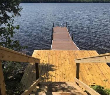 Lyon Mountain House | Well-appointed Adirondack cabin directly on 9-mile lake