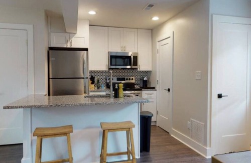 Villa Heights Apartment | West Elm™ Furnished Oasis with Dog-Friendly Back Patio