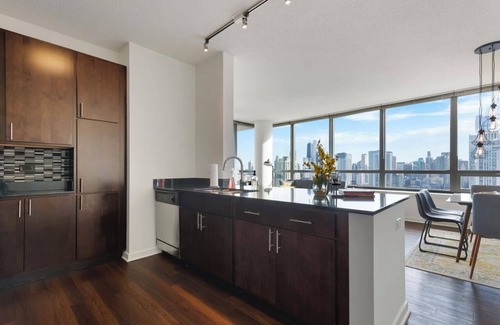 Downtown Chicago Apartment | West Loop Luxe 2BR: Balcony, Skyline Views