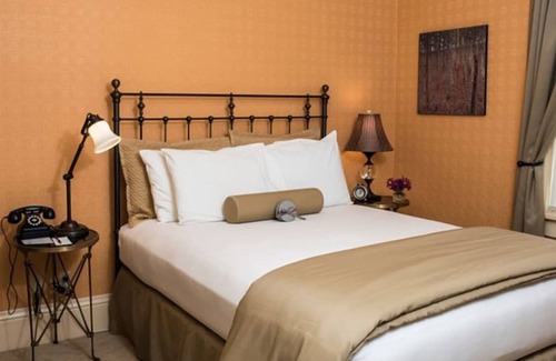 Cody Hotel | Western Charm Awaits in this Cozy Room w/Complimentary Breakfast