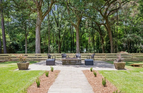 Covington House | "Whispering Oaks" Enjoy this 4-bedroom home with HUGE backyard