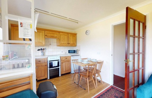 Hayle Cottage | Winray is set in a quiet spot on a grassy bank, accessible via several stone steps