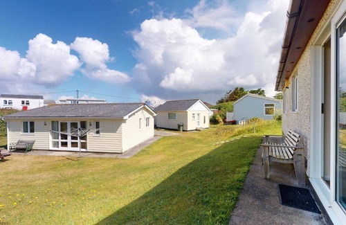 Hayle Cottage | Winray is set in a quiet spot on a grassy bank, accessible via several stone steps