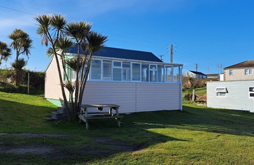 Hayle Apartment | With views across the park and distant sea views, West View is a perfect beachside bolthole