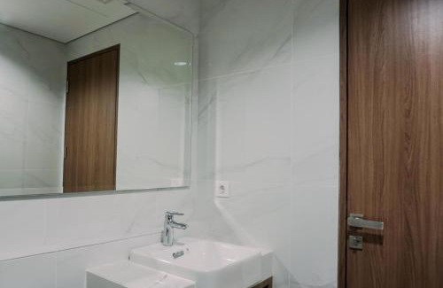 Pinang Apartment | Wonderful and Homey 1BR The Smith Alam Sutera Apartment By Travelio